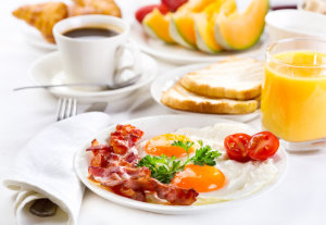 Eating breakfast increases brain chemical involved in regulating food intake, cravings